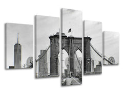 Černobílý tisk Brooklynského mostu a panorama New Yorku na plátně s viditelným dřevěným rámem Papilora.