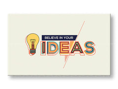 Moderní interiér zdobí obraz s motivem žárovky a nápisem „Believe in your ideas“ v modrých, oranžových a žlutých tónech, umístěný nad dřevěnou konzolí s vázou a svíčkou Papilora.