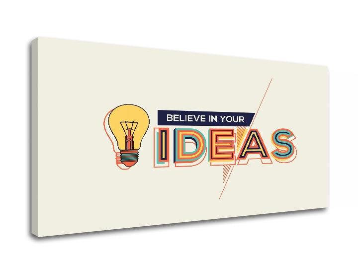 Kompozice s žárovkou a nápisem „Believe in your ideas“ v modrých, oranžových a žlutých barvách Papilora.