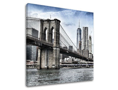 Pohled na Brooklynský most a panorama New Yorku s modrou oblohou na potištěném plátně Papilora.