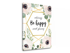 Na plátně je zobrazen květinový motiv s bílými sasankami a zelenými listy, doplněný zlatým geometrickým rámem a nápisem „always Be happy and shiny“ na bílém pozadí, Papilora.
