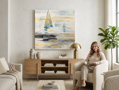 Ručně malovaný obraz LODĚ 80x80 cm v moderním obývacím pokoji. Obraz s bílými, modrými a zlatými tóny krásně doplňuje interiér.